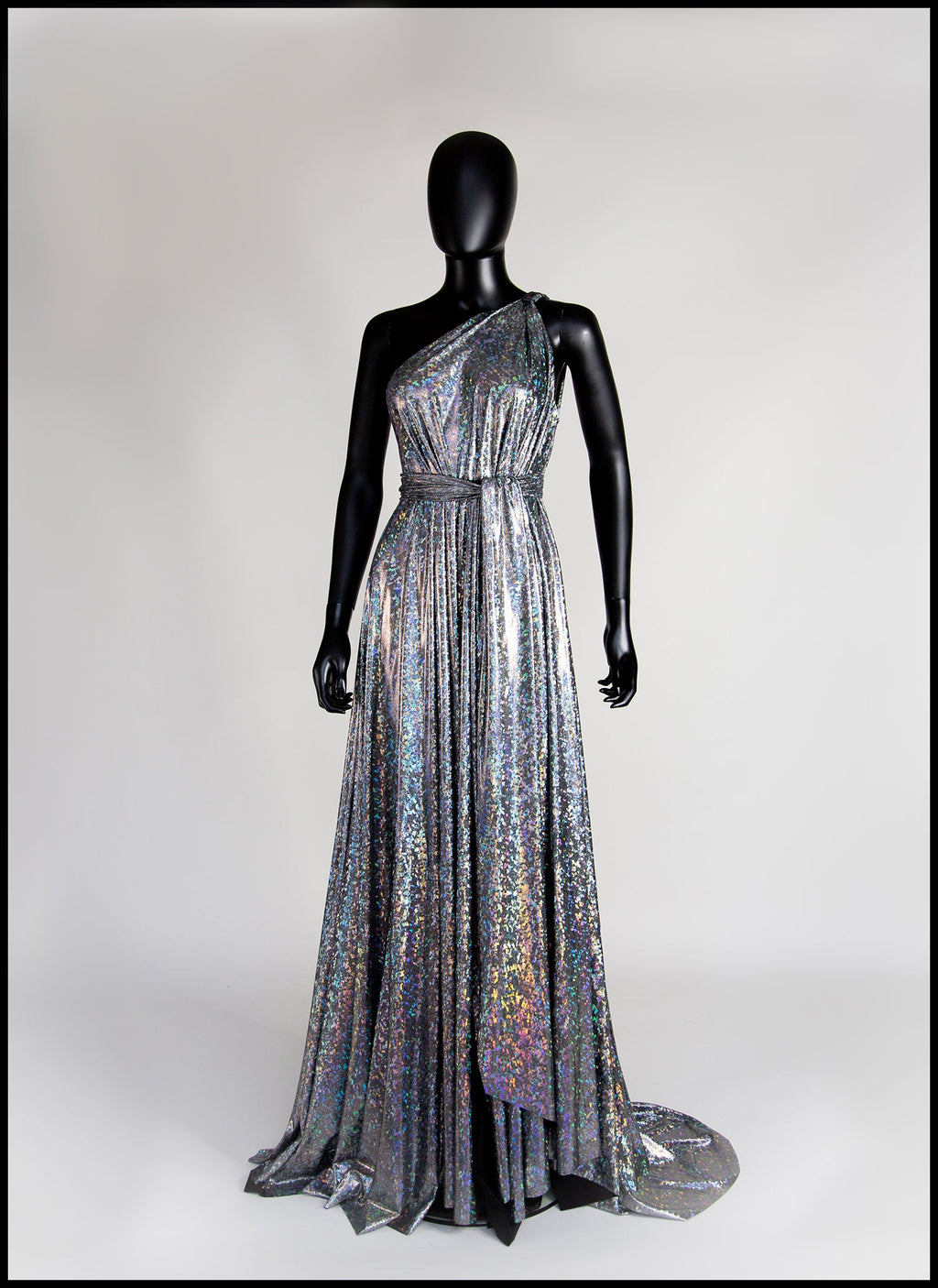 Cher - One Shoulder Silver Holographic Gown