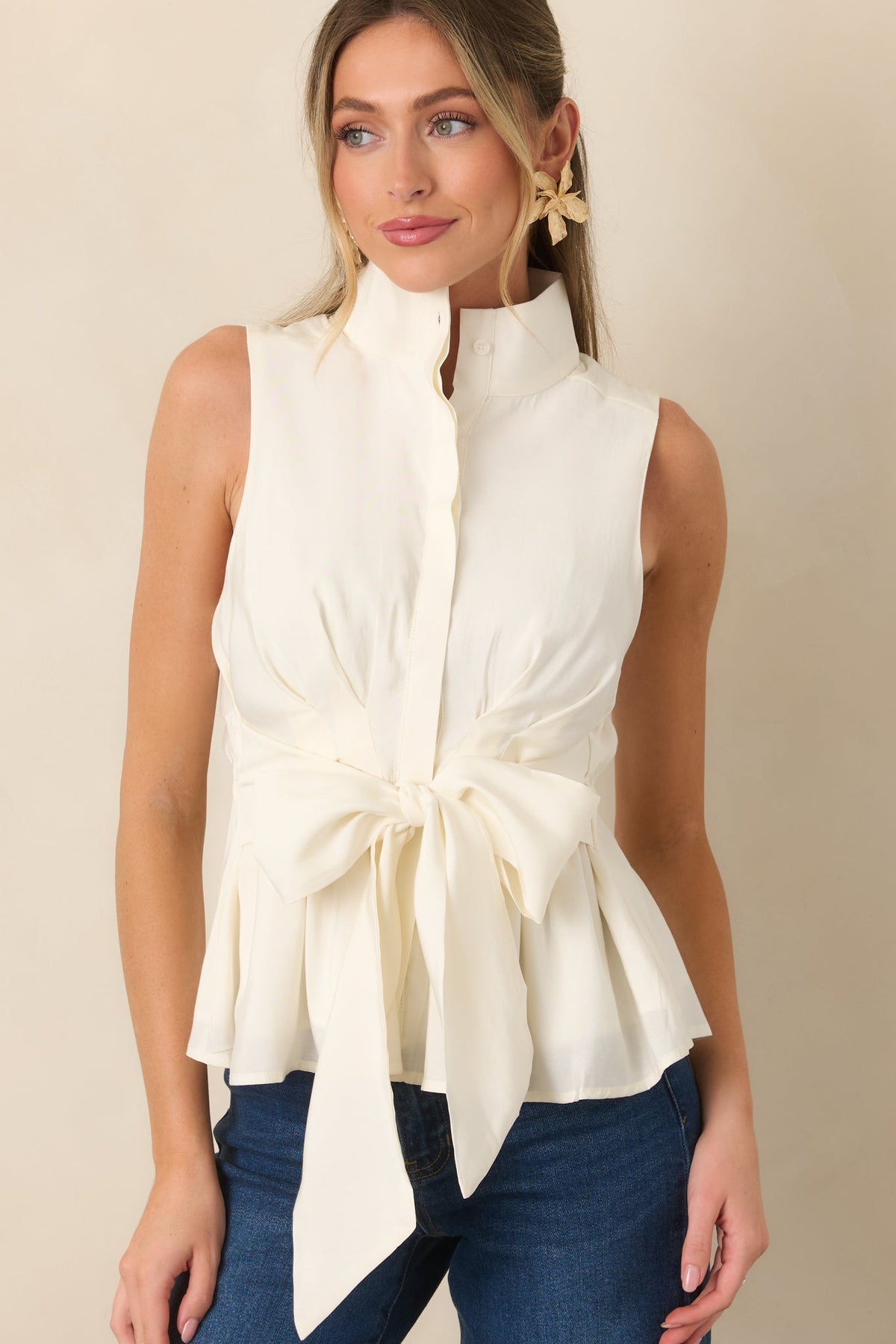 In Good Shape Ivory Sleeveless Tie Front Peplum Blouse
